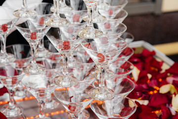 Festive glasses on the festive table during the Banquet. Alcoholic beverage