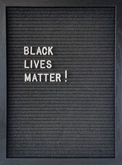 Black letter board with BLACK LIVES MATTERS white title on it.