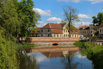 Obraz premium May 27, 2016. Kuldiga, Latvia. Brick bridge at the street Baznicas. 