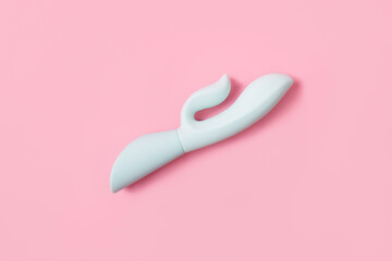 on a pink background sex product, toy for adults