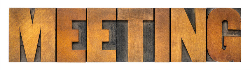 meeting - isolated word abstract in vintage letterpress wood type, business or social concept