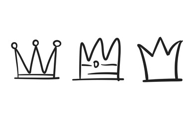 Set of hand drawn doodles crowns. Vector illustrations. Queen and King symbols.