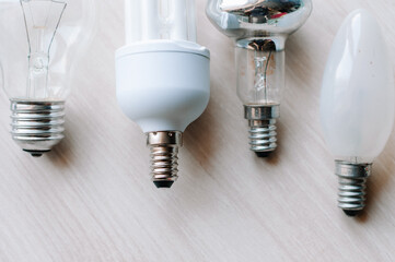 are different types of light bulbs - incandescent, energy-saving and LED. Group of light bulbs