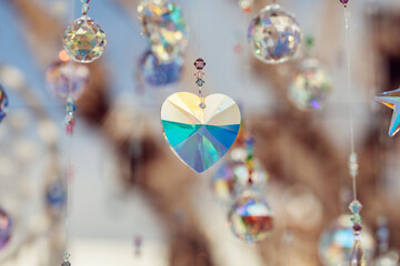 Multi-colored Background with crystal spheres, hearts and stars in the air, like kind fairytail in the air