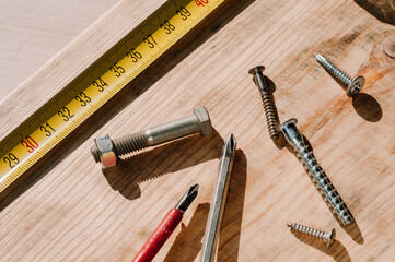 woodworking tolls, chisels and mallet on a workbench