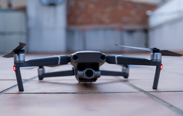 generic matt black drone placed on the ground ready for take off