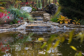 artificial waterfall with a pond