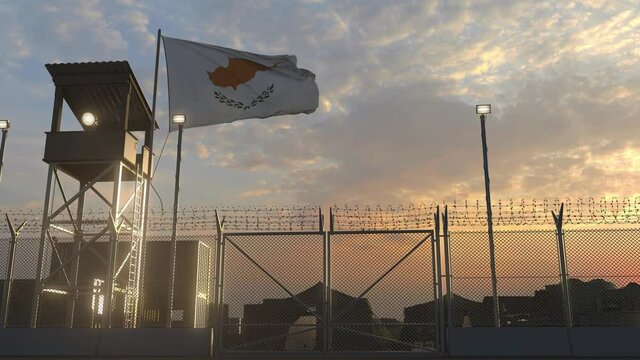 Flying flag of Cyprus above military base in the evening
