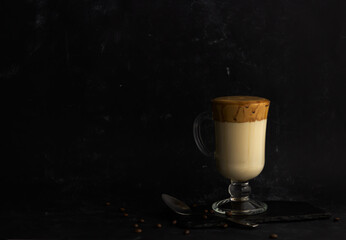 Dalgona coffee. Trendy homemade iced drink with coffee foam and milk