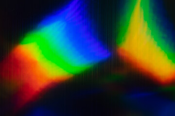 high res full frame macro photo of abstract pastel iridescent holographic foil background with...