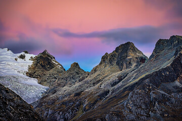 Mountain Peaks in Cordillera Blanca, Peru, South America During a Colorful Pink and Blue Sunset Sky
