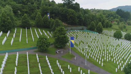 Srebrenica, Bosnia-Herzegovina, June 01 2020: Srebrenica-Potocari memorial and cemetery for the victims of the 1995 massacre, aerial view.