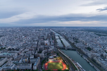 Panorama of Paris in the evening from the height of bird flight at sunset