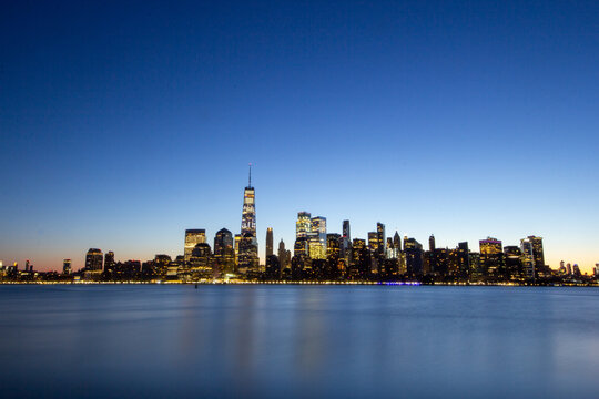New York, NY / United States - Feb. 8, 2010: Wide angle landscape image of the lower Manhattan skyline at sunrise during the winter.
