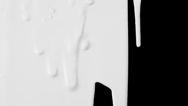 White paint being poured over black surface. High contrast. Perfect for an organic, original transition
Use SCREEN and MULTIPLY transfer modes for black and white respectively to become transparent.