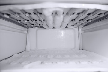 Dirty, unwashed and frosty refrigerator. Violation and non-compliance with sanitary and...