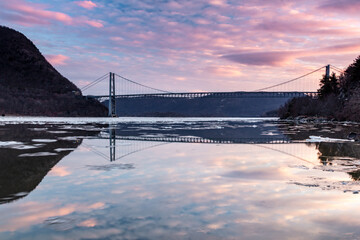 Fort Montgomery, NY / United States - Jan. 26, 2020: A view of the Bear Mountain Bridge at Sunset. ...