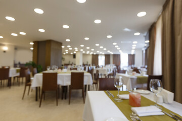 Blurred photo of restaurant interior in hotel
