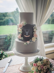 Grey and pink wedding cake