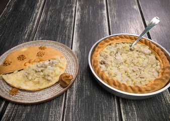 Potato Pie on the wooden table with opened top part