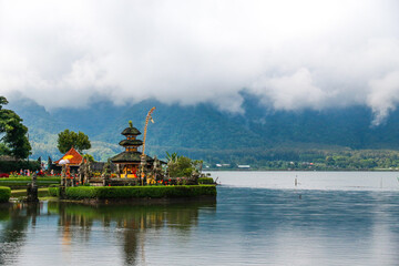 Fototapeta premium Pura Ulun Danu Bratan, Hindu temple on Bratan lake landscape, one of famous tourist attraction in Bali, Indonesia