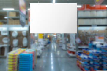 Blank advertising billboard hanging in the supermarket