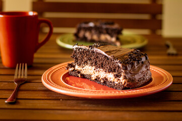 chocolate cake with chocolate icing and chocolate filling