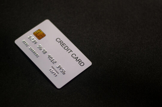 Close-up photos, white credit cards, focus cards with a black background