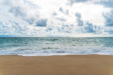 Tropical nature clean beach and white sand in summer with sun light blue sky and bokeh background.