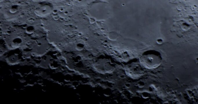 Moon walk from an amateur telescope. Waxing crescent moon as seeing from southern hemisphere. Amazing the moon surface full of craters from meteorites coming from the universe and crashing our Moon
