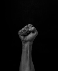 Black Lives Matter. Human hand. Fist raised up. Protest Against Racism.