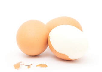 boiled chicken eggs and peeled isolated on white background