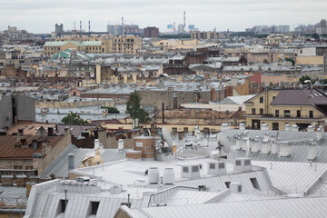Fototapeta premium View on Saint Petersburgs' roofs from a cathedral height. Saint Petersburg in different directions.