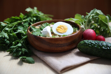 products ingredients for okroshka, summer soup or salad on a wooden background