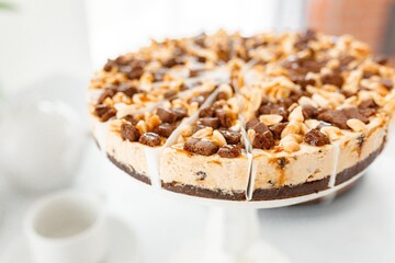 Sweet tasty cheesecake on table