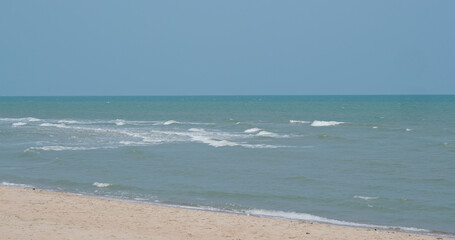 Sea wave beach and blue sky