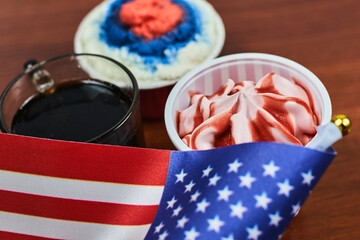 Celebrating Fourth of July. Happy Independence day. Sweets decorated in traditional colors and American national flag