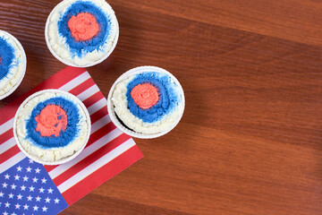 Fototapeta na wymiar Celebrating Fourth of July. Happy Independence day. Sweets decorated in traditional colors and American national flag