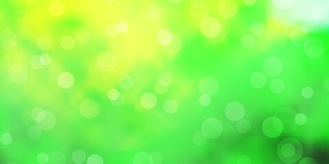 Fototapeta na wymiar Light Green, Yellow vector texture with disks. Abstract decorative design in gradient style with bubbles. Design for posters, banners.