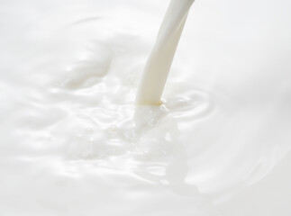 Close up of the milk pouring