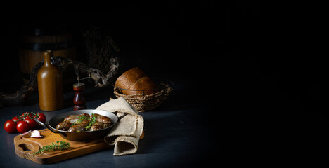 Homemade white sausage fried with onion and herbs