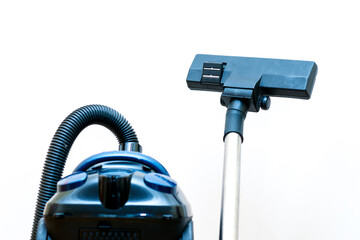 Cleaning concept - vacuum cleaner on white background close up