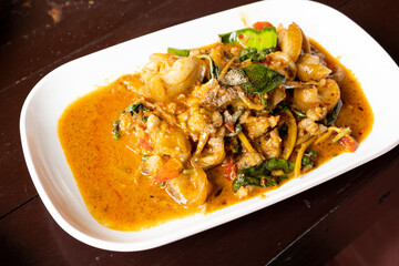 Spicy pork with Thai style curry paste