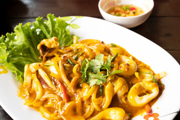 Squid stir-fried with egg yolk, Thai style