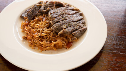 Pasta Steak Sauce in a White Plate