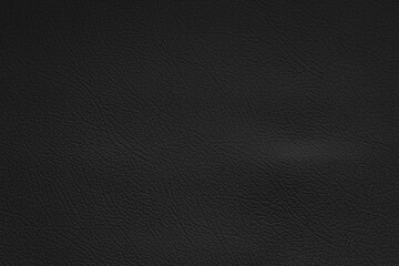 Black leather texture can be used as background. Artificial leather close-up