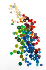 Wallpaper of various size and color vintage buttons. White isolated background.  Colorful background for illustration.  Top view.