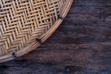 Bamboo weaving machine placed on a wooden table
