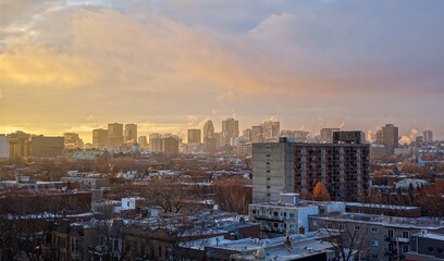 Plateau district of Montreal from 10th floor looking towards hazy morning Down Town