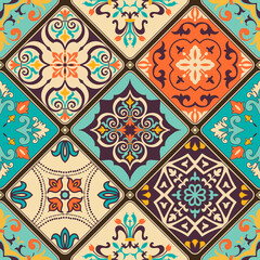 Seamless colorful patchwork tile with Islam, Arabic, Indian, ottoman motifs. Majolica pottery tile. Portuguese and Spain decor. Vector illustration